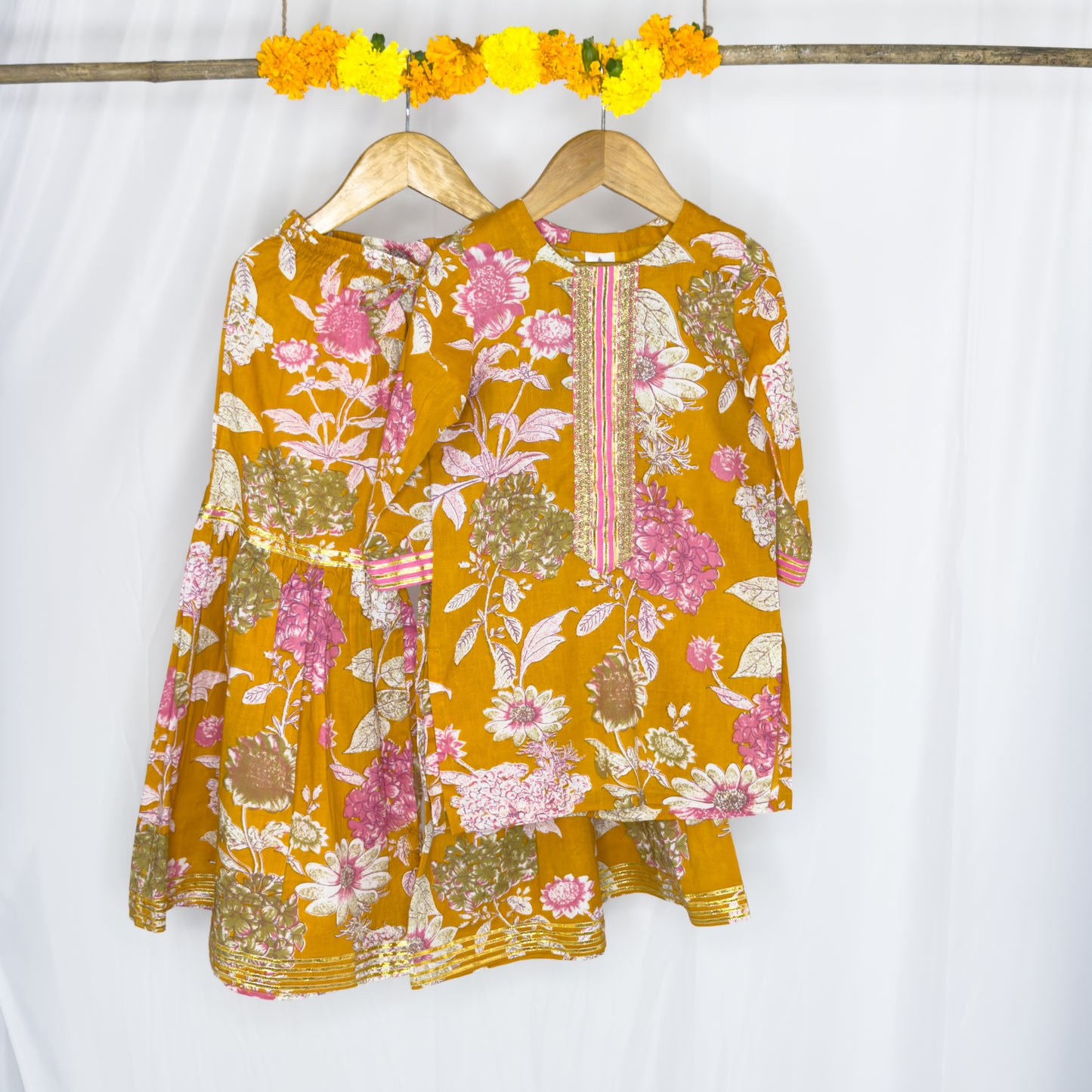 Aadhwika- mustard pink floral shahrara set