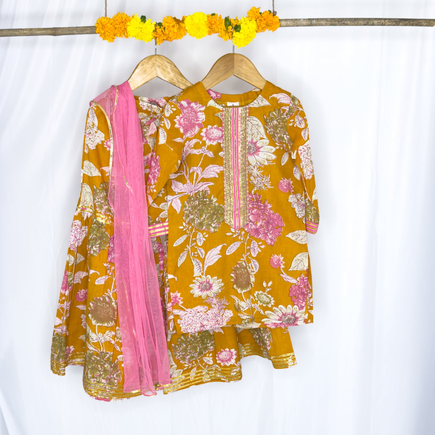 Aadhwika- mustard pink floral shahrara set