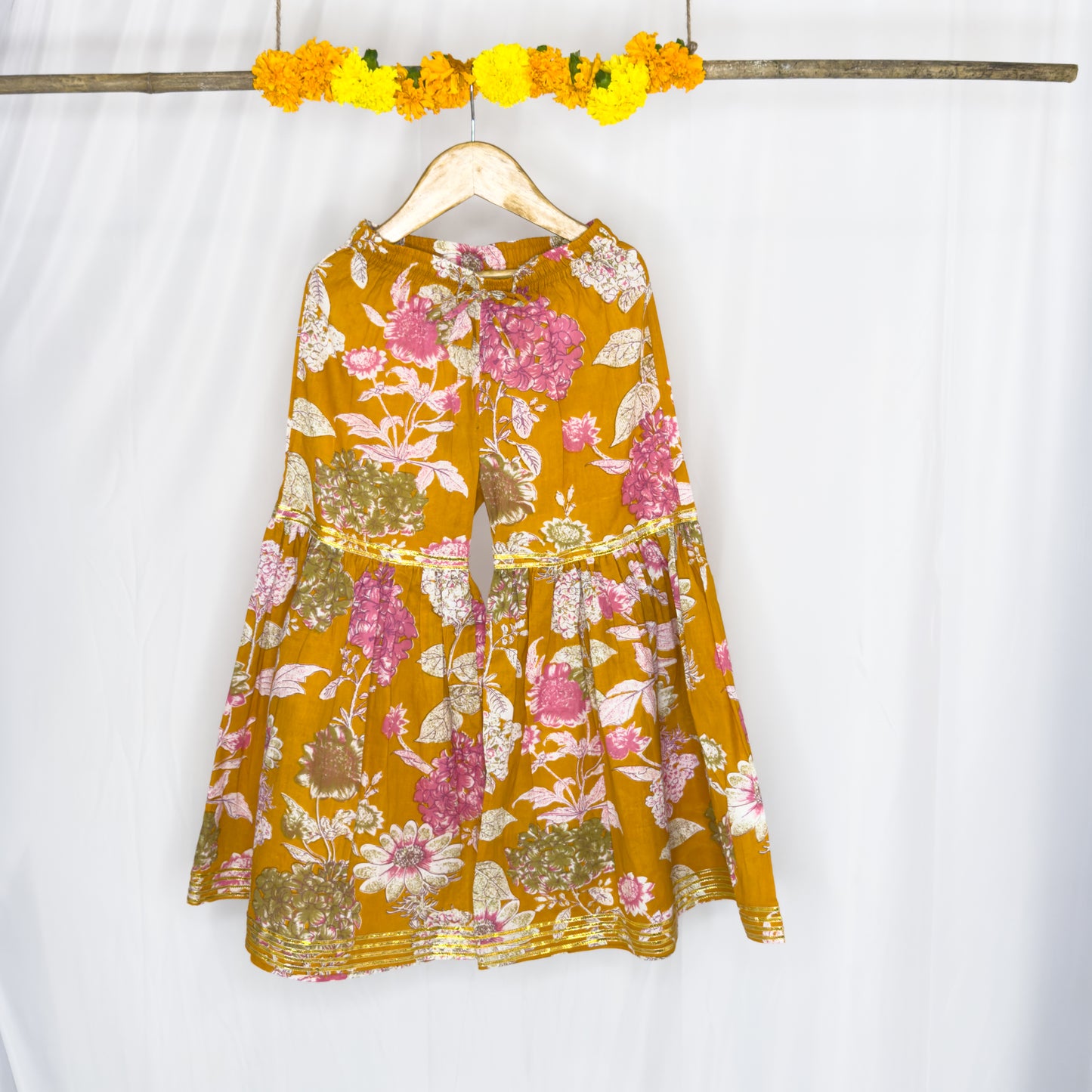 Aadhwika- mustard pink floral shahrara set