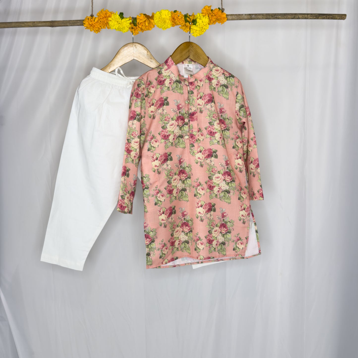 Adhiraaj- a peach floral jacket kurta set