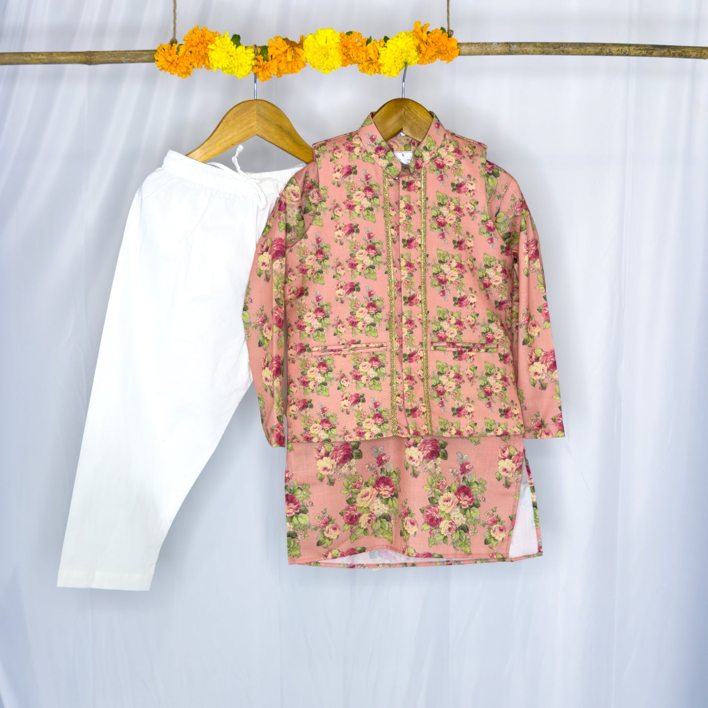 Adhiraaj- a peach floral jacket kurta set