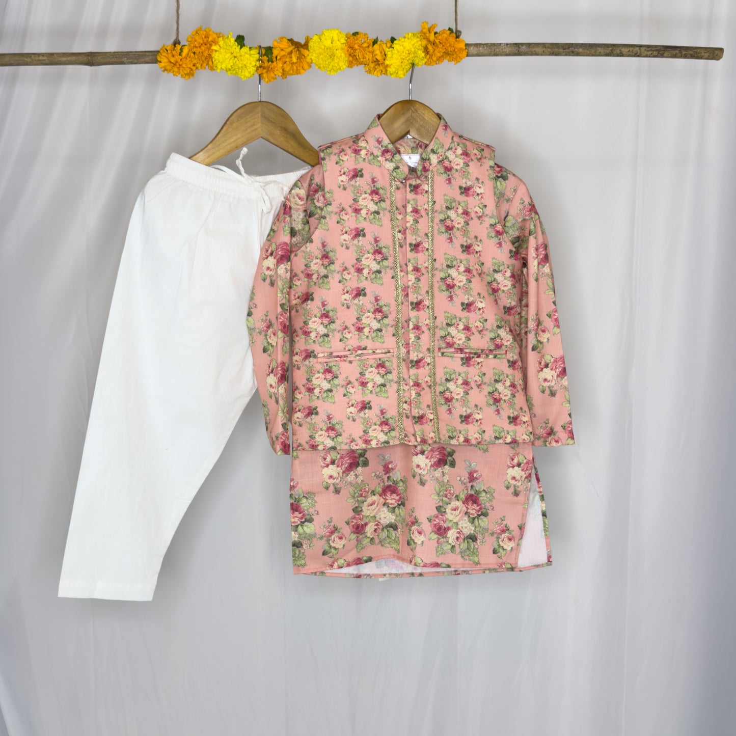 Adhiraaj- a peach floral jacket kurta set
