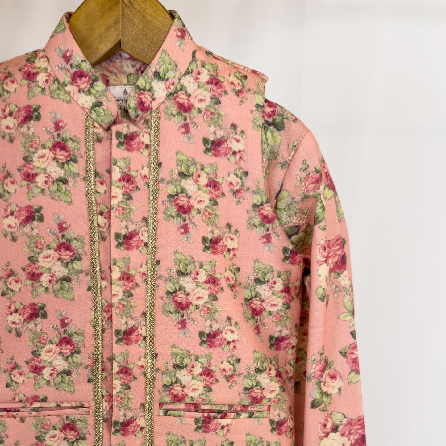 Adhiraaj- a peach floral jacket kurta set