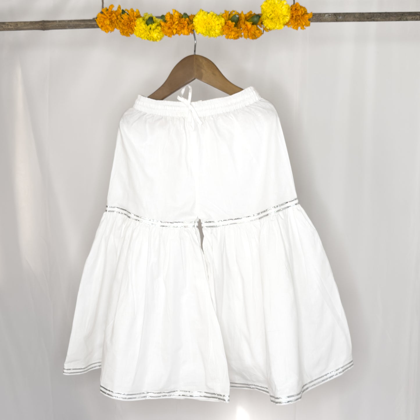 Saumya- a baby pink angrakh shahrara set