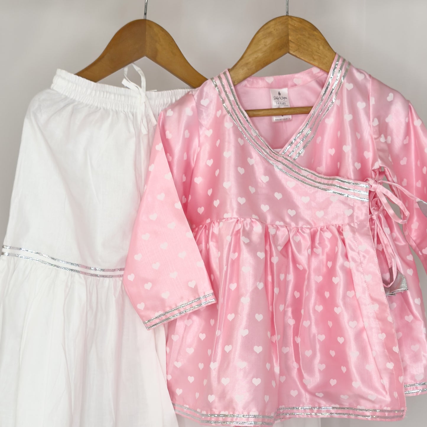 Saumya- a baby pink angrakh shahrara set