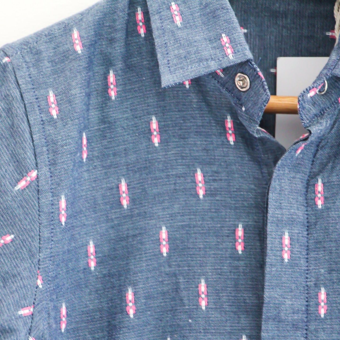 Blue Shirt with Pink Motifs